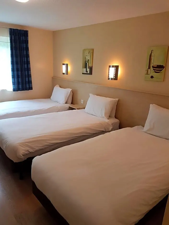 Travel Plaza Hotel - Chambres
