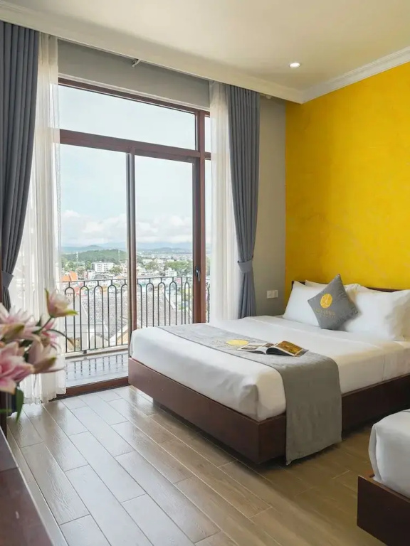Deluxe Quadruple room with balcony