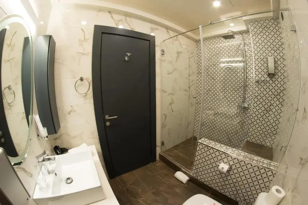 Atera Business Suites - Chambres
