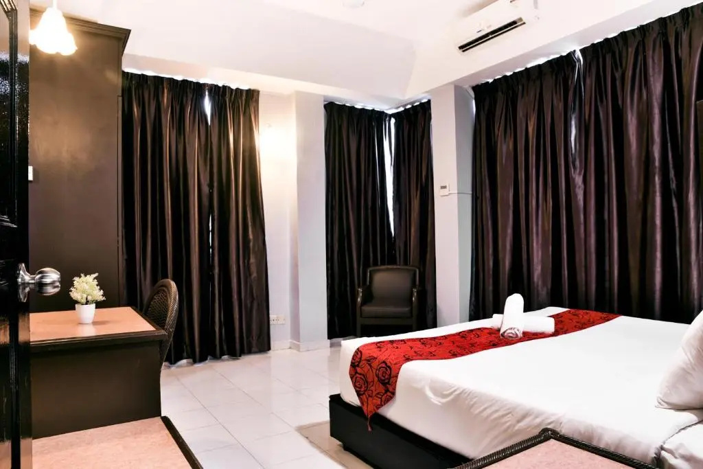 Leisure Cove Hotel & Apartments - Chambres