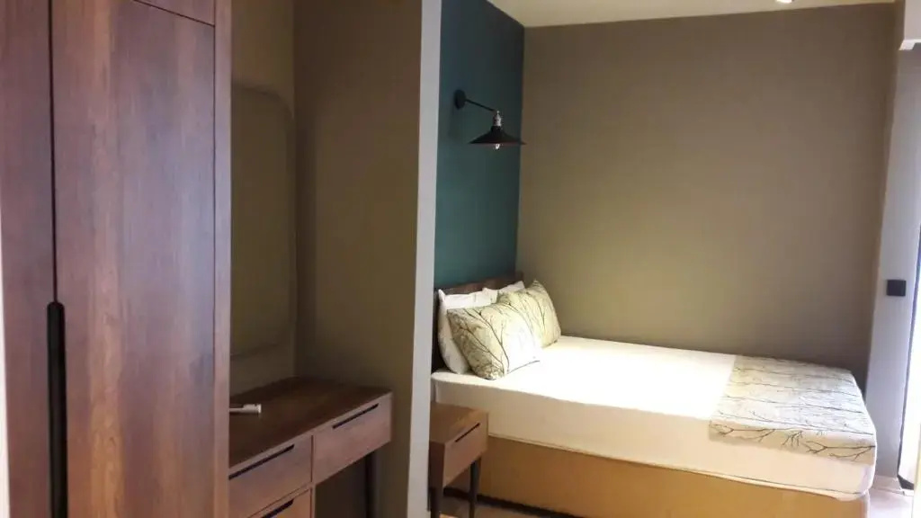 Standard Triple room with garden view