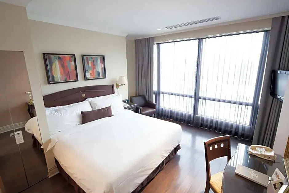 Grand Hotel & Suites - Chambres