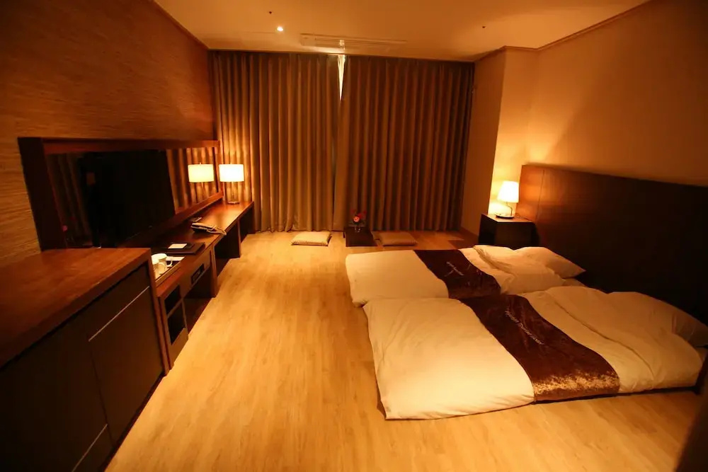 Hyunjin Tourist Hotel - Chambres