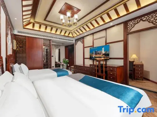 Chuanlong Hotel - Chambres