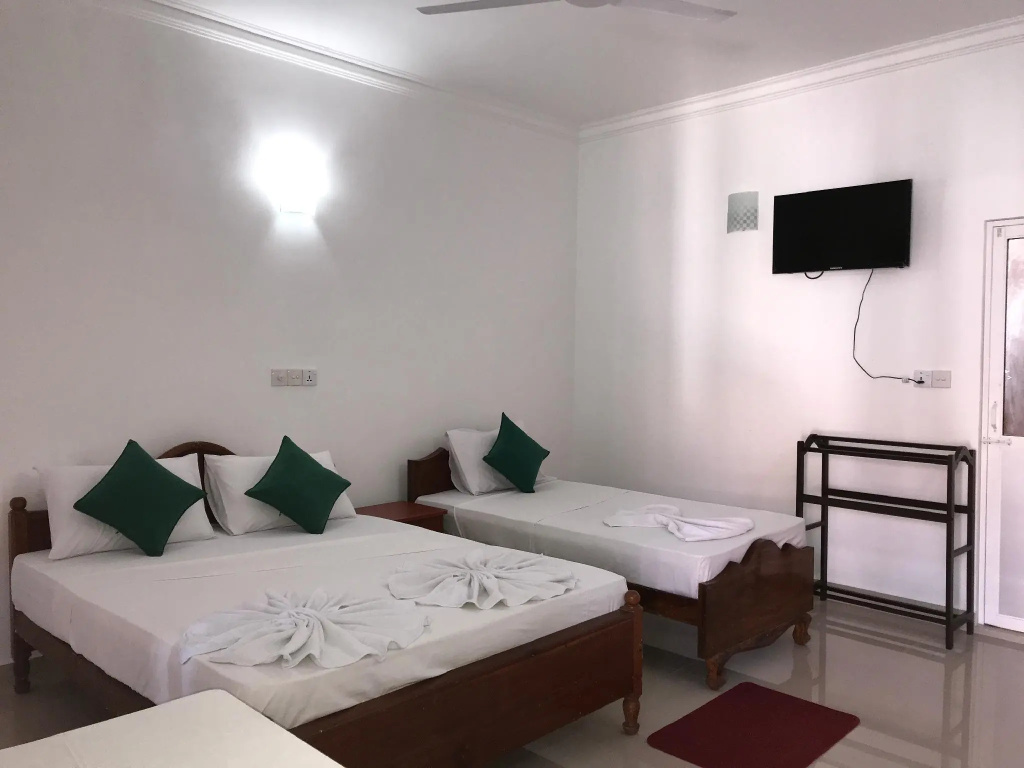 Oasis Beach Resort - Chambres