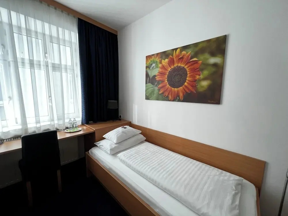 H+ Hotel Ried - Chambres