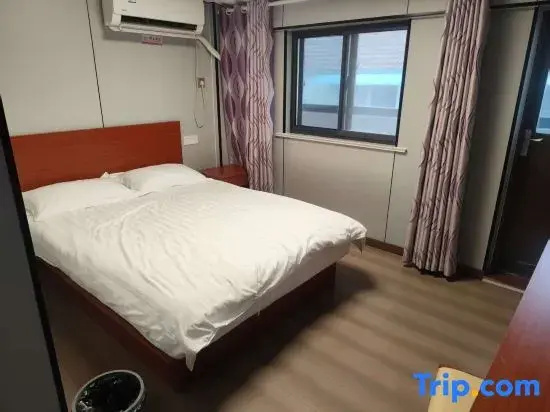 Jin Tai Hotel - Chambres