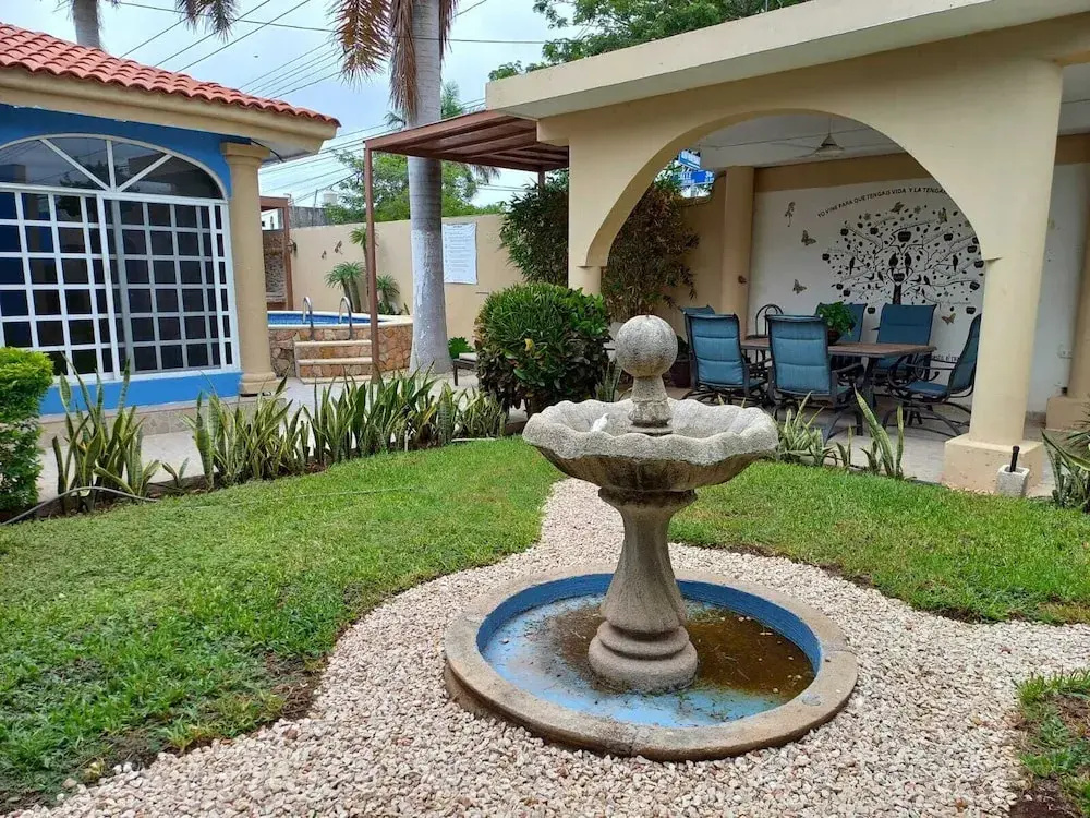 Room in Apartment - Cozy Mérida Retreat With Pool & Garden View