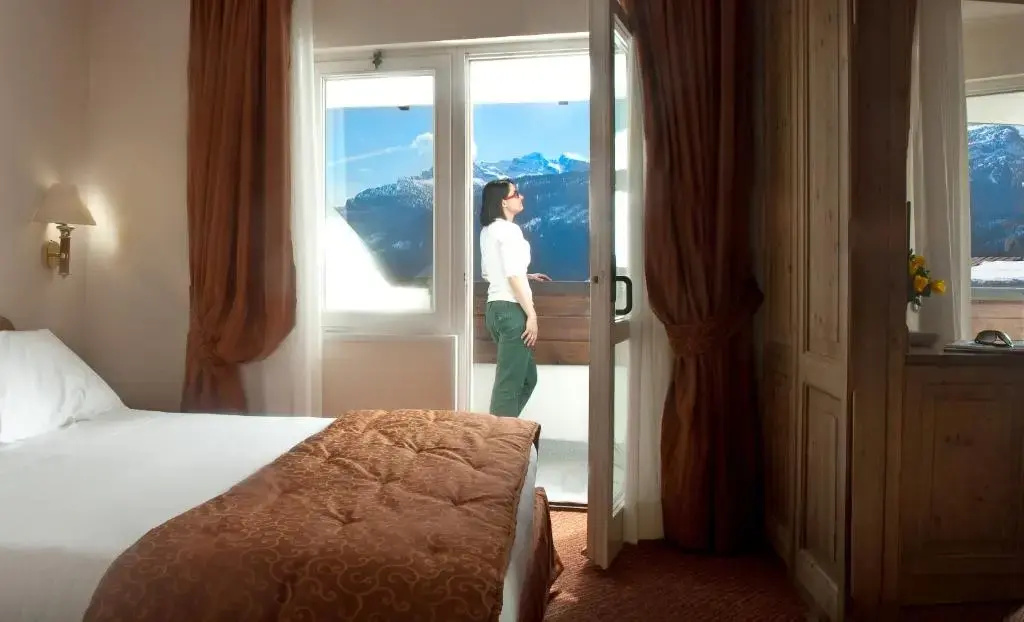 Hotel Alaska Cortina - Chambres