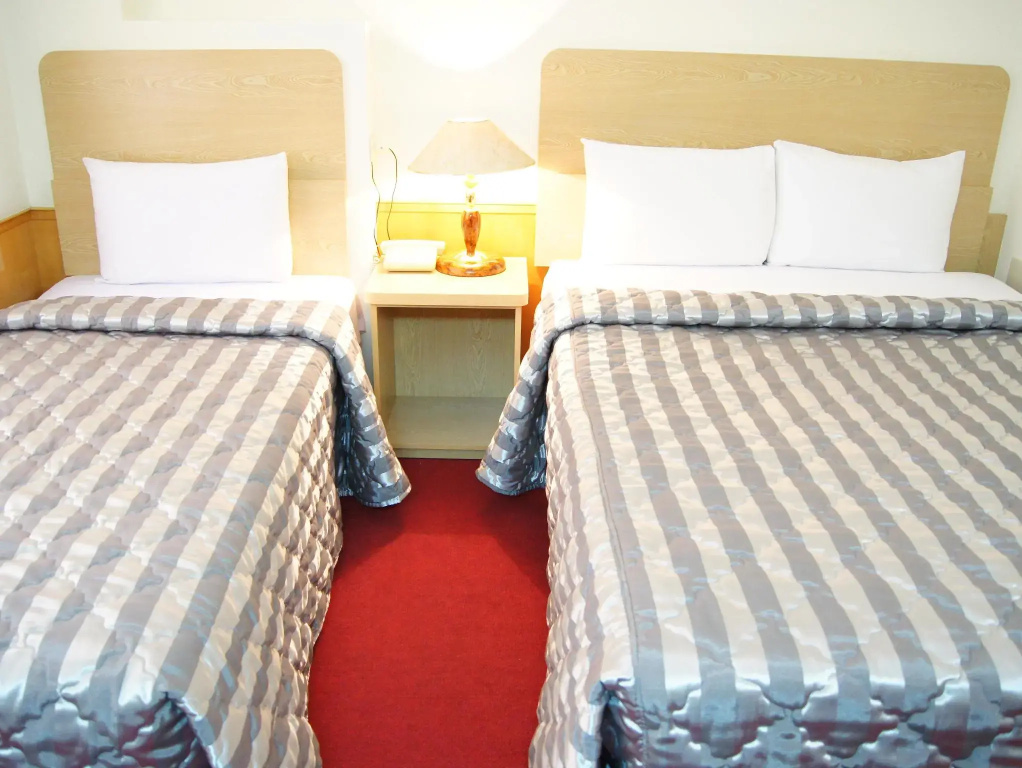 Famouse Hotel - Chambres