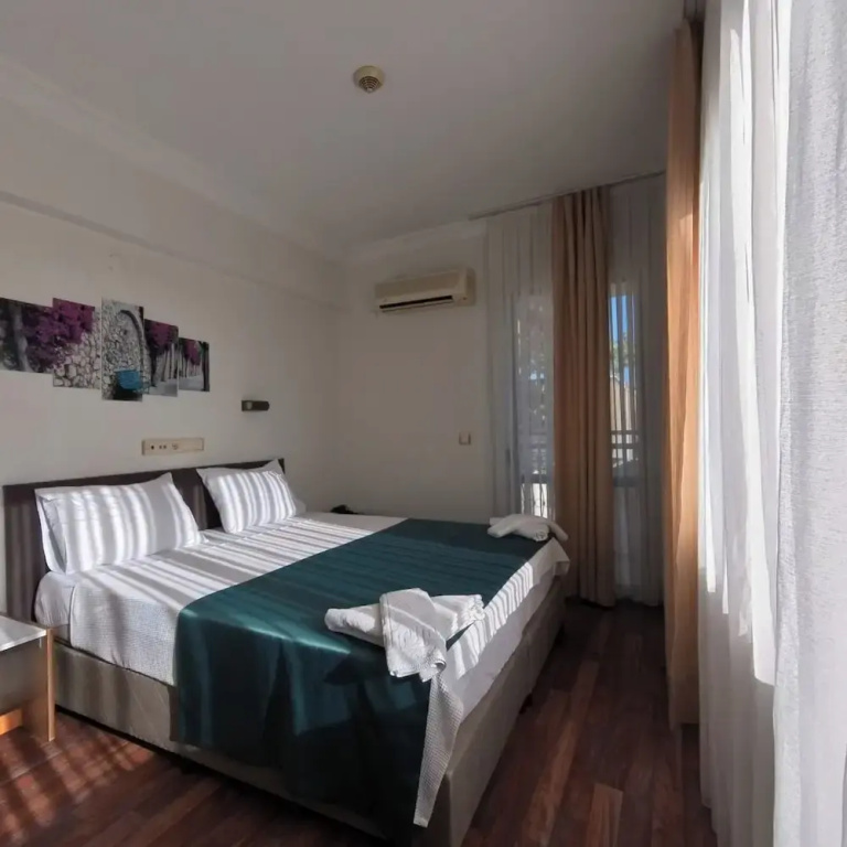 1 Bedroom Comfort Triple room with balcony and with sea view