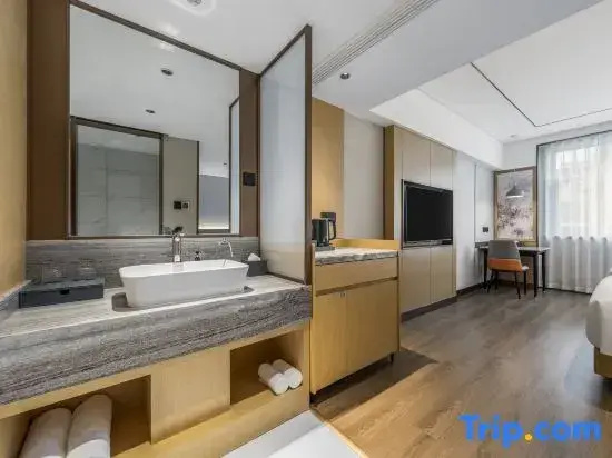 Xinyue Hotel - Chambres
