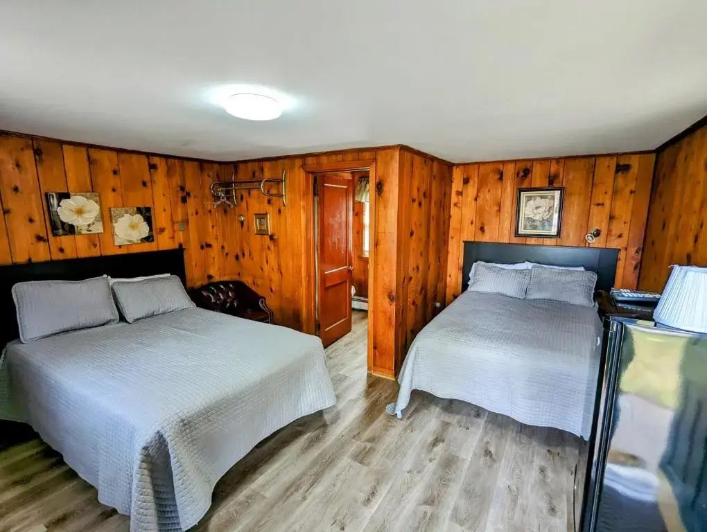 Standard Quadruple room with garden view