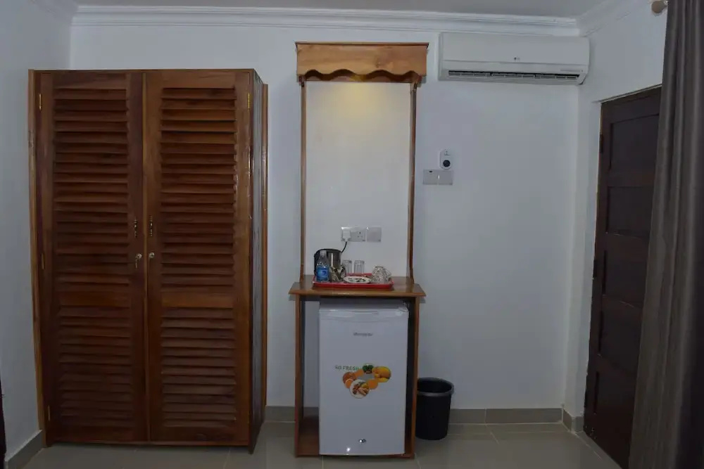 Chukwani Executive Inn - Chambres