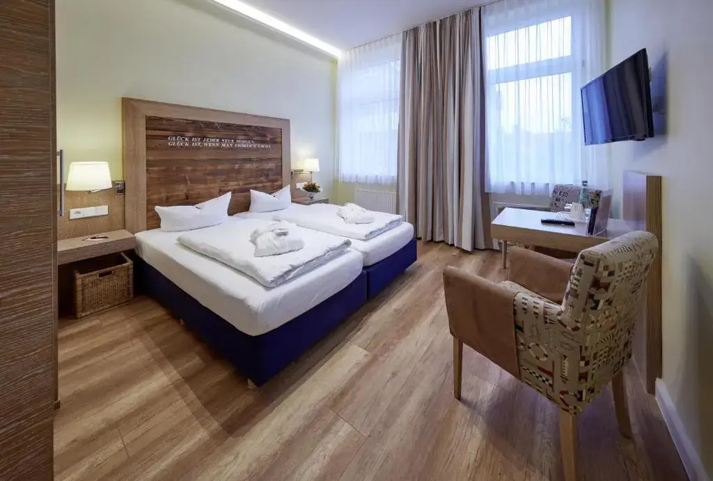 Vier Jahreszeiten Strandhotel - Chambres