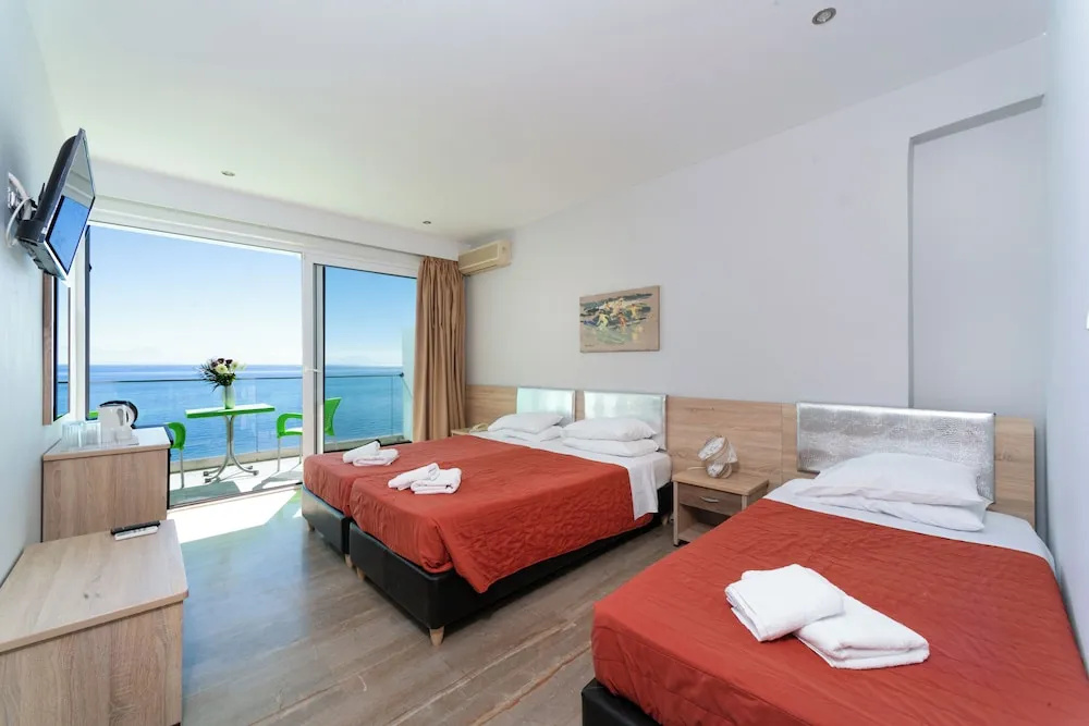 Standard Triple room with balcony and with sea view