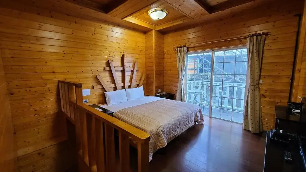 Standard Quadruple room with garden view