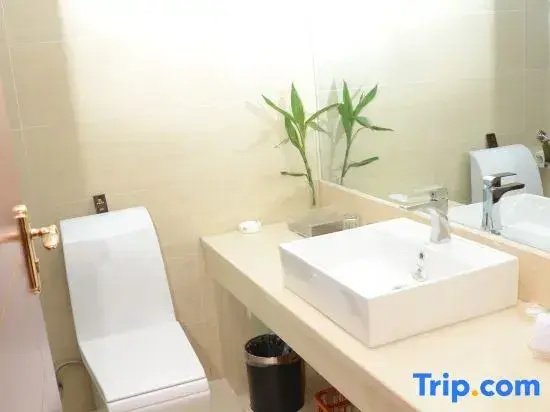 Yi Long Hotel - Chambres