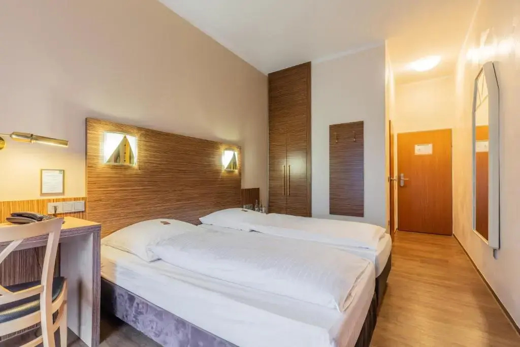 Sport - und Tagungshotel De Poort - Chambres