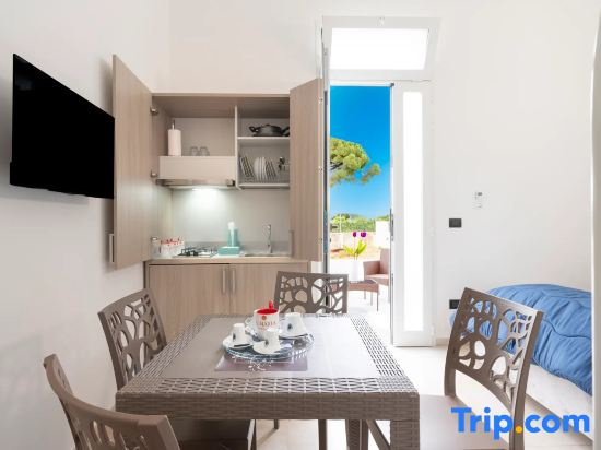 Monolocale Vela – Nuovo con Wi-Fi, Clima e Giardino a Torre Lapillo