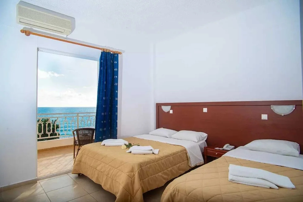 Standard Triple room with balcony and with sea view
