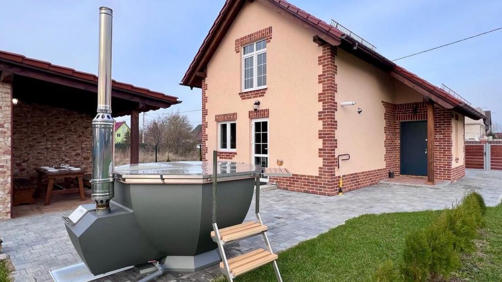 Четырёхместный коттедж Standard в Гостевой дом с банным чаном