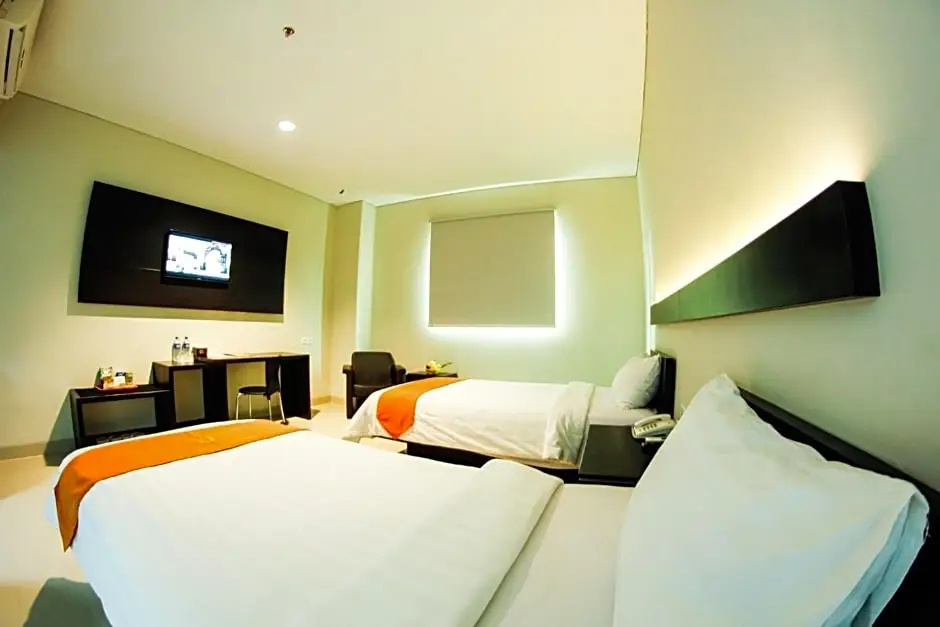 Alpha Hotel - Chambres