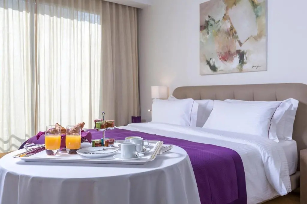 O Monot Hotel - Chambres