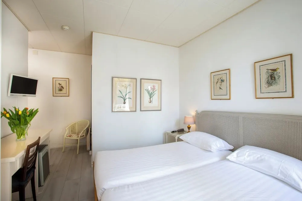 Piccolo Hotel - Chambres