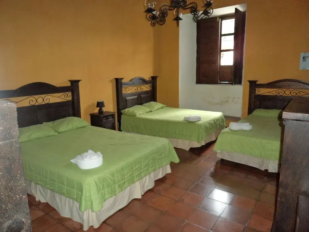 Chez Juanca Hotel Cafe - Chambres