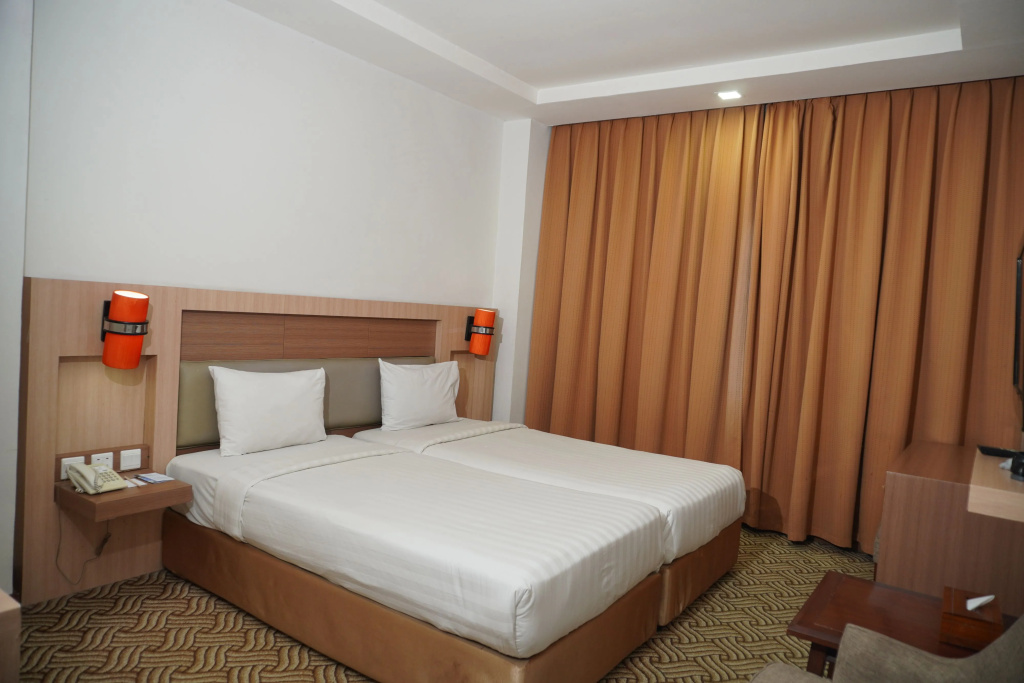 Abadi Hotel Malioboro Jogja - Chambres