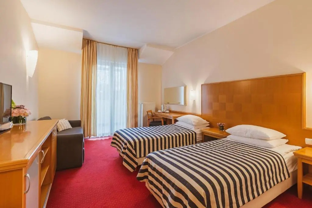Ramada Hotel & Suites by Wyndham Kranjska Gora - Chambres