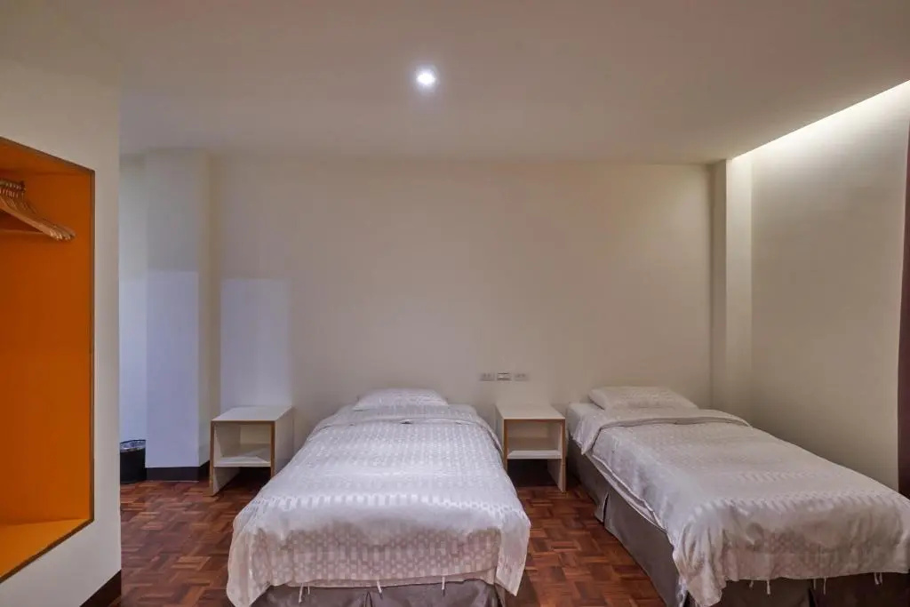 Yung An Business Hotel - Chambres