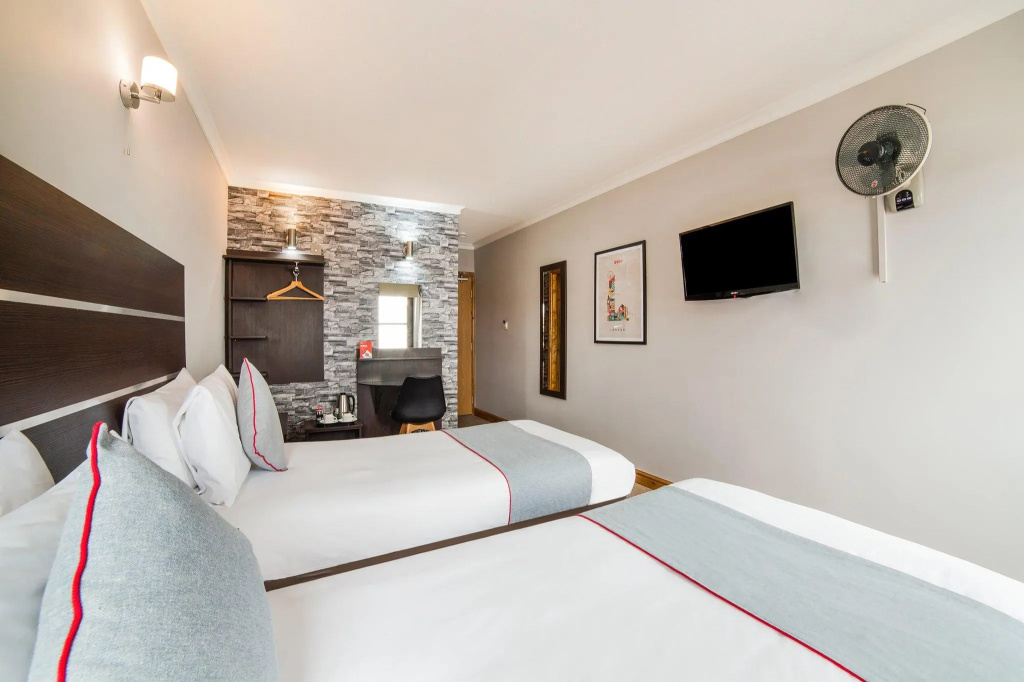Epsilon Hotel - Chambres