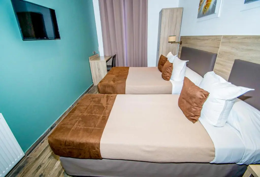 Hôtel Parisien - Chambres