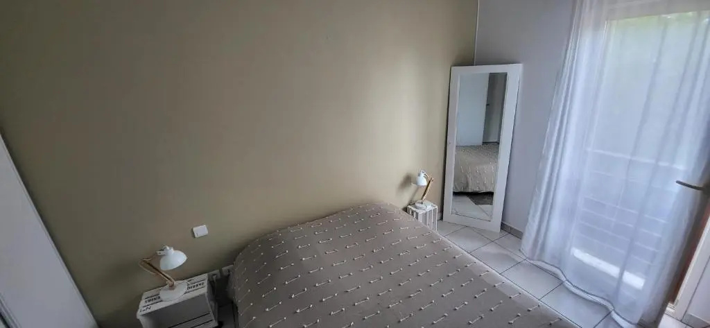 Voir la photo 3 — Appartement 2 chambres Balcon Parking privé Centre Village
