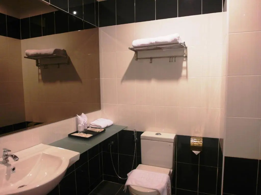 Supreme Hotel - Chambres