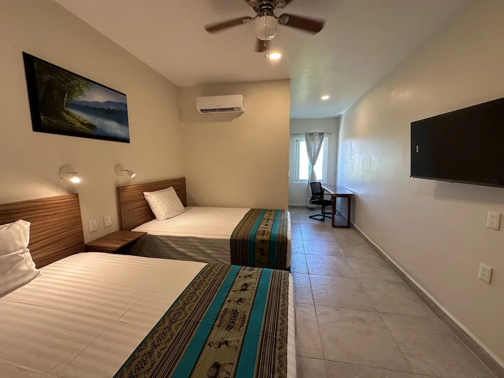 Standard Quadruple room with courtyard view