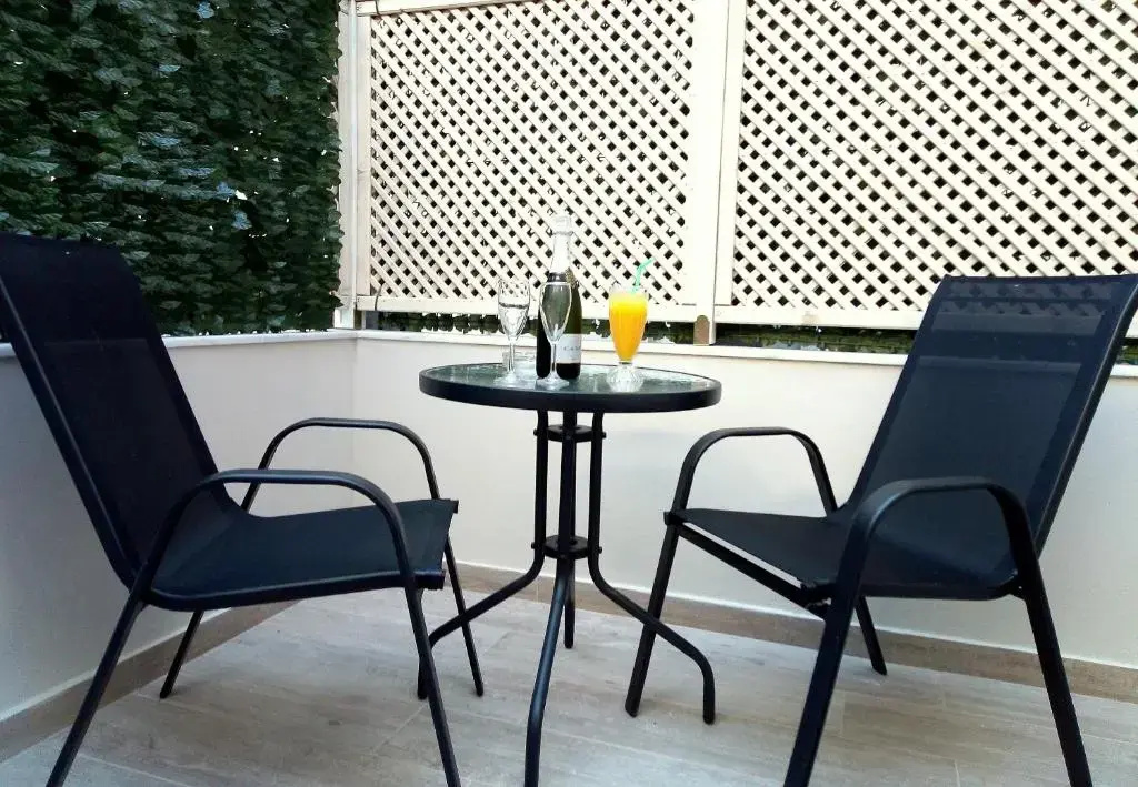 Caravel Apartment Hotel - Chambres