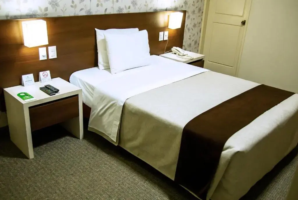 Palmetto Hotel Business La Perla - Chambres