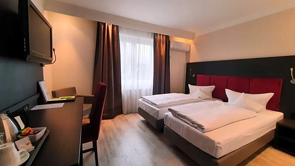 Astralis Hotel Domizil - Chambres
