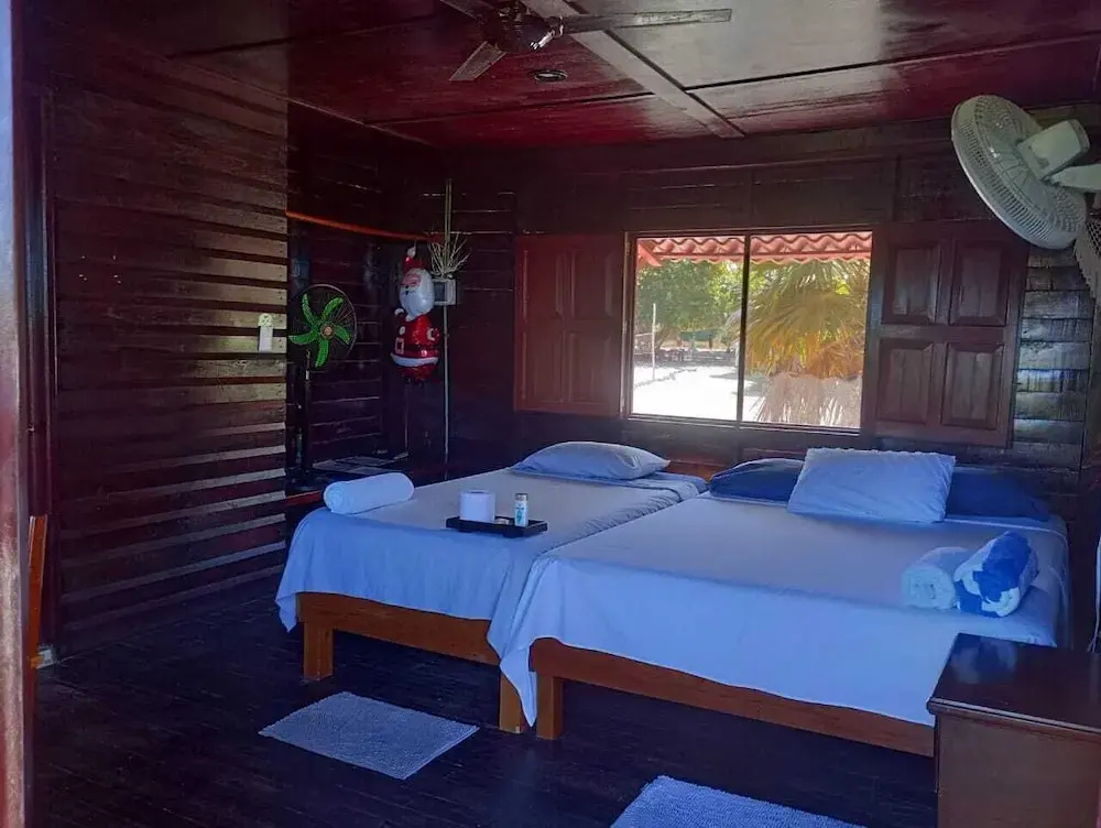 Standard Quadruple room with garden view