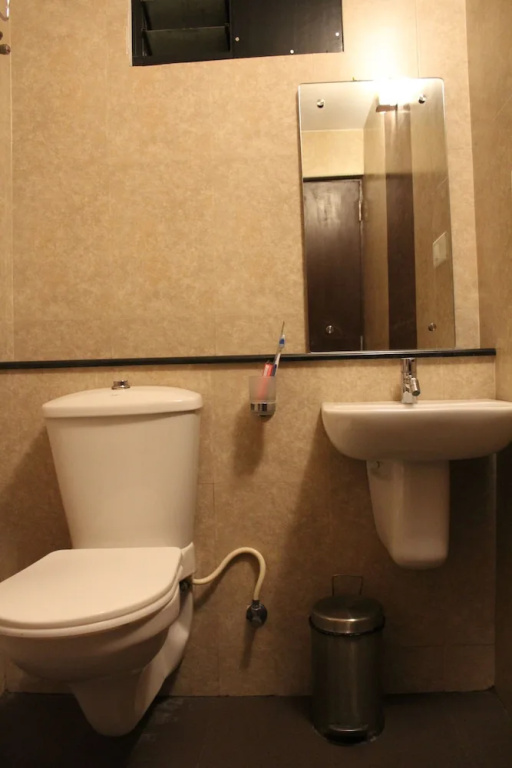 Hotel Karpagam International - Chambres