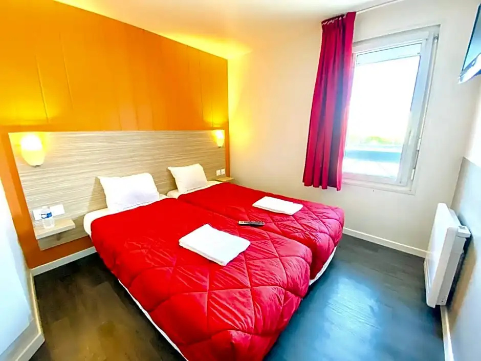 Premiere Classe Coignieres - Chambres