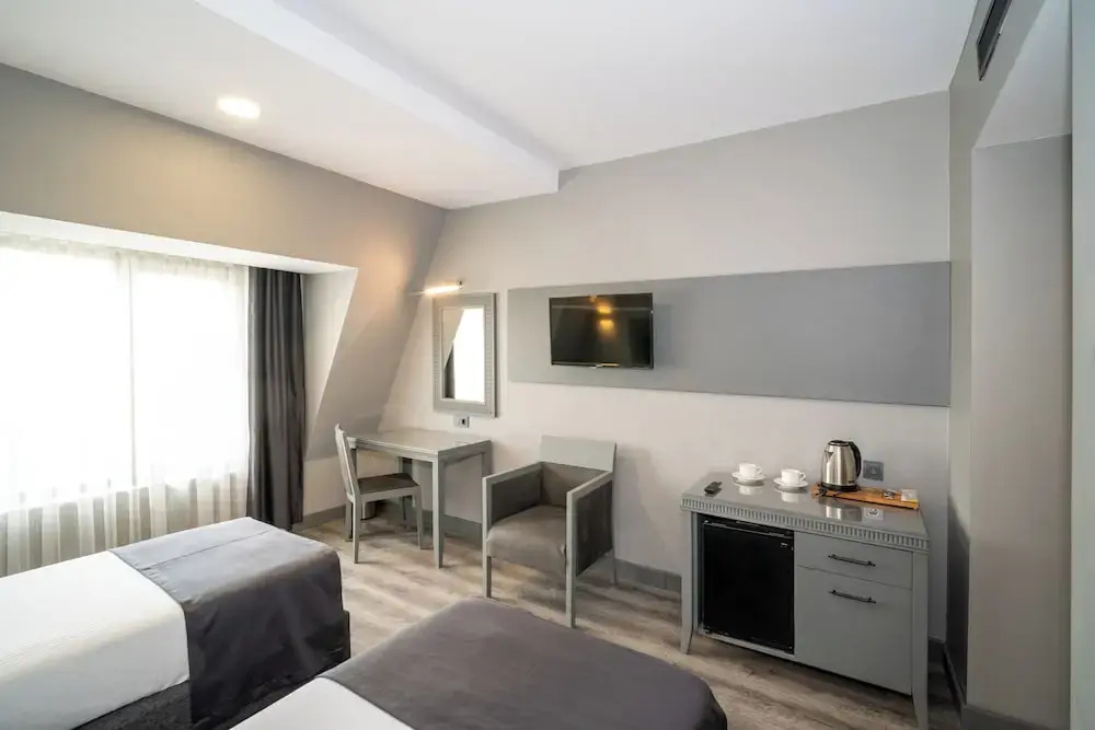 Grand S Hotel - Chambres