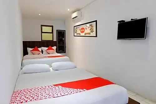OYO 626 Augustina Home - Chambres
