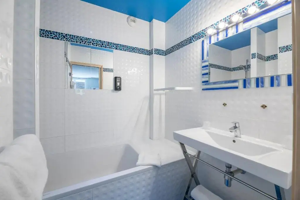 Hôtel Cosmopolitain - Chambres