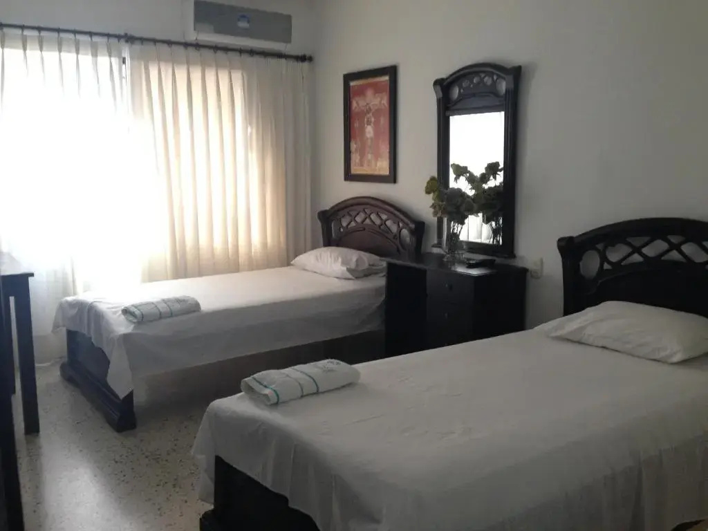 Casa Hotel Miriam - Chambres