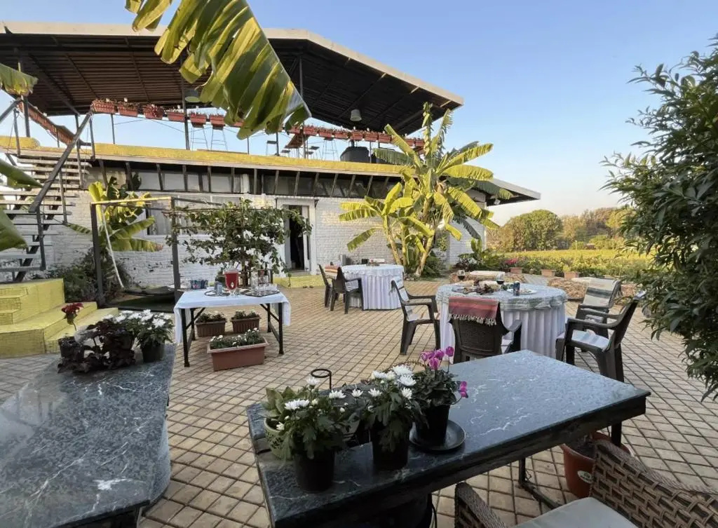 SaffronStays Onellaa, Nashik - infinity pool villa surrounded by a vineyard
