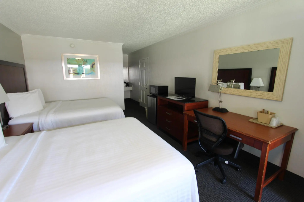 At Home Inn & Suites - Chambres